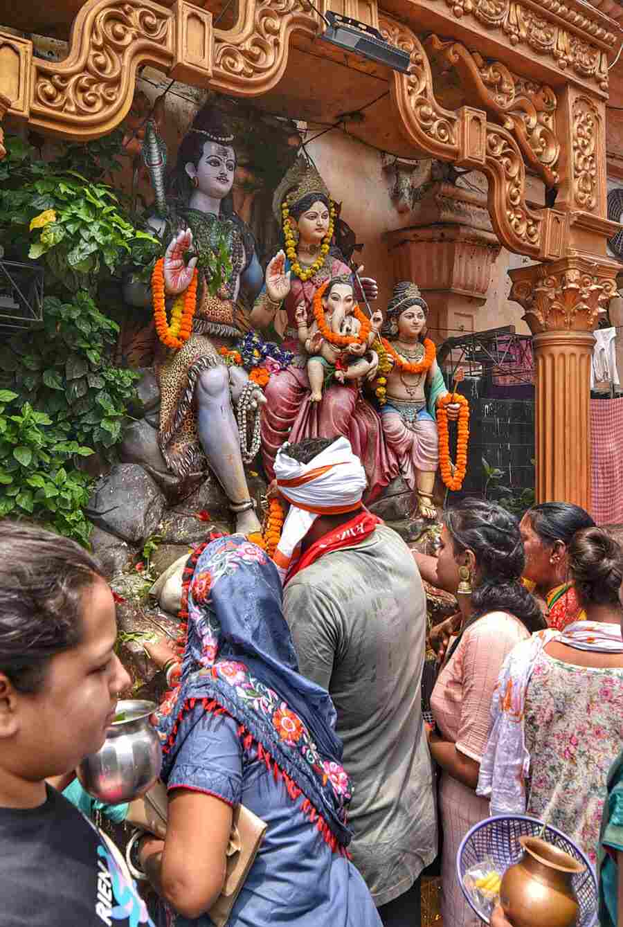 People offer prayer at Bhootnath Temple at Nimtala Ghat on Shravan Somwar  