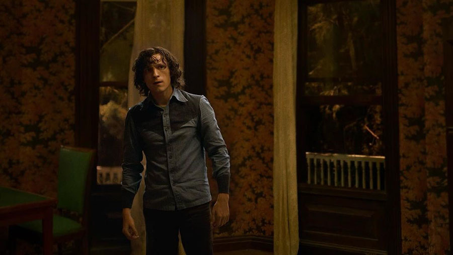 Holland sports a long-hair look in the series The Crowded Room, set to premiere in two weeks.