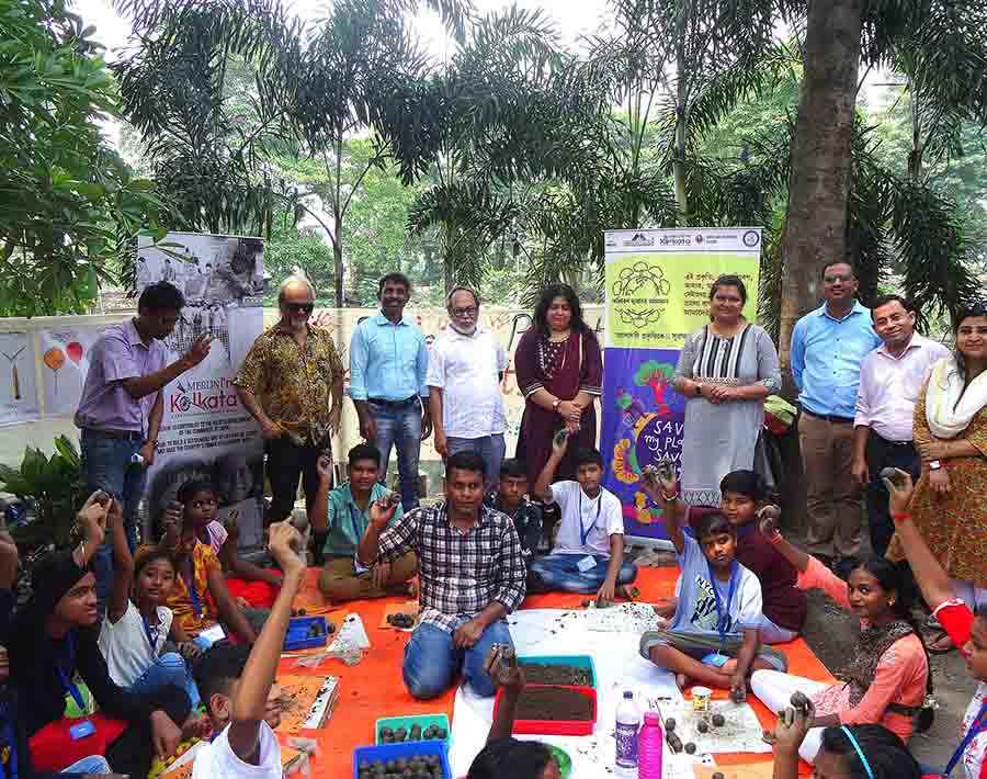 Merlin Group began its World Environment Day celebrations with a series of workshops for slum children, followed by a plantation drive. The CSR wing of Merlin Group joined hands with international child rights organisation Terre des Hommes Suisse and Development Research Communication and Services Centre (DRCSC) to protect the planet and make the city greener. The organisation decided to educate and sensitise 20 children from slums about the importance of nature through workshops on seed-ball making, eco-brick making, and a plantation drive.    The event started with a seed ball making workshop, where the children were taught an ancient Japanese technique of natural farming where indigenous seeds layered with compost are rolled into a ball of clay to assist germination. This was followed by the dignitaries planting trees and donating saplings to the children. After this, the children were taught how to make eco bricks, where a plastic bottle is densely packed with used plastic to create reusable building blocks, which are used in garden walls, furniture and even teaching materials. The event concluded with a street theatre presentation by the children on the theme, ‘Save Trees, Save Earth’. 