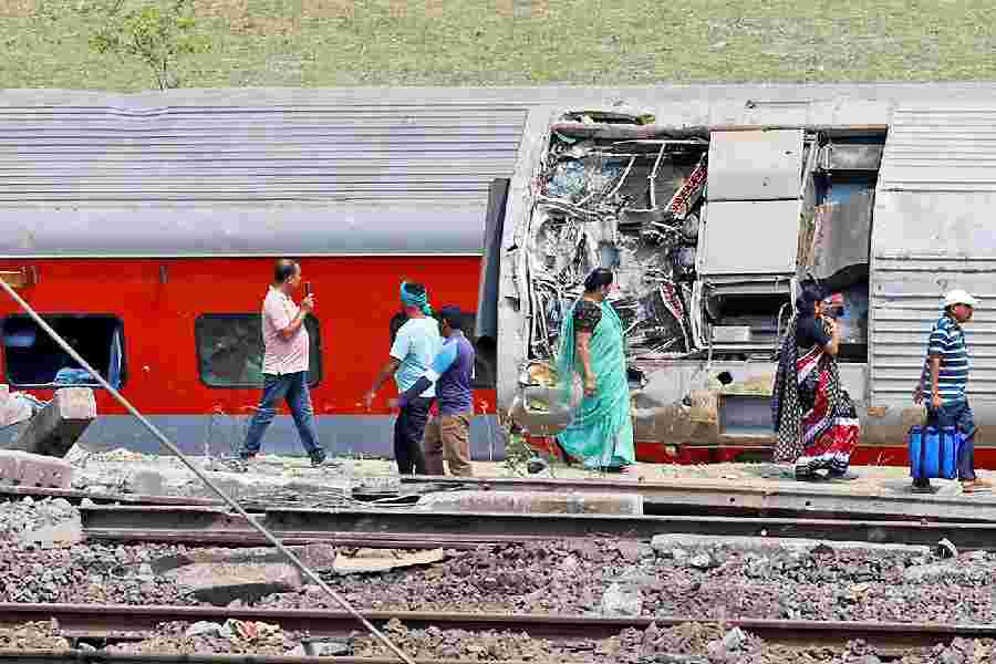 A damaged coach at the site of the train accident in Balasore district in Odisha on Sunday.