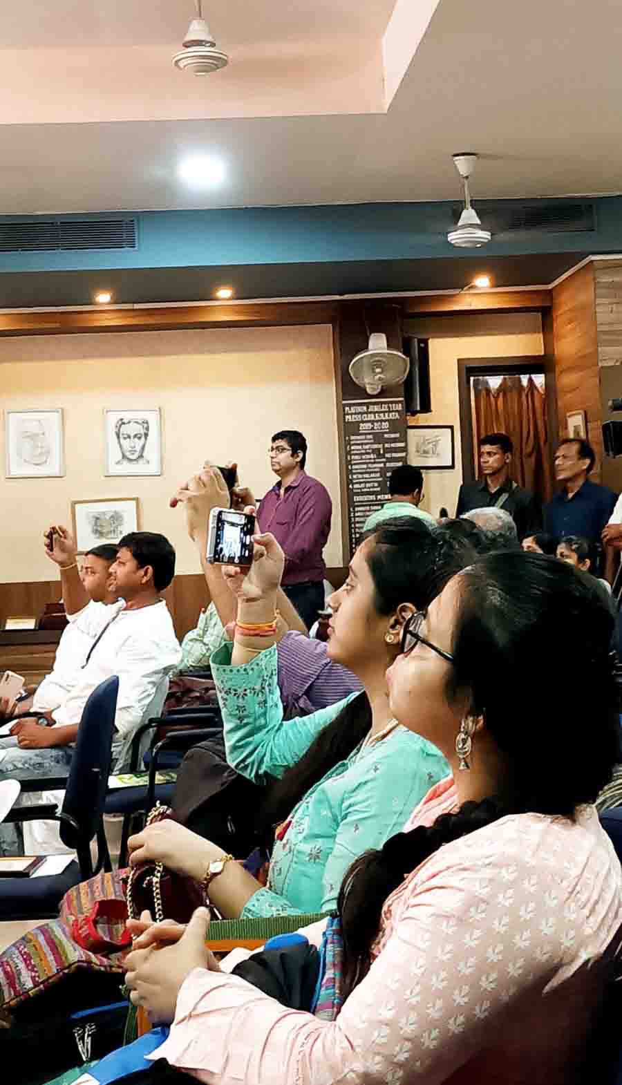 The audience capture moments of the event in which mayor Firhad Hakim  formally launched work on a climate action plan for Kolkata, which would work towards making the city cleaner and greener