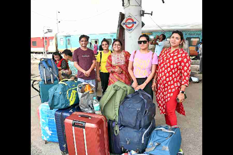 Jaideep Jain with his family members at Shalimar station on Wednesday. Jain, a businessman based in Visakhapatnam, was on his way home from a family trip to Nepal. “I am not nervous. In fact, I am feeling upbeat about boarding the Coromandel,” said Jain. The tickets were bought a couple of months ago. A series of cancellations of trains in the wake of the accident had him worried. “I am lucky that the Coromandel resumes from Shalimar today,” he said.