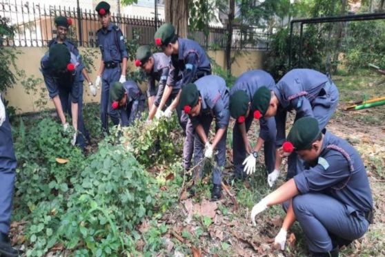 The NCC cadets of our school cleaned the park and planted saplings in the park