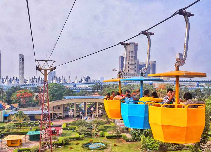 Visitors at Science City enjoy a ropeway ride on Thursday afternoon 