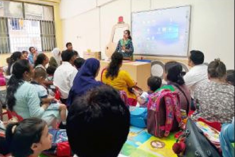 Parents attend a session at Mahadevi Birla World Academy
