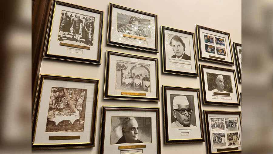 Framed photos of prominent guests 