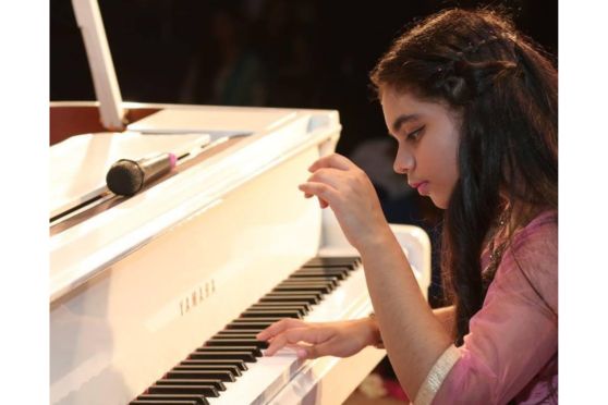 Gauri Mishra playing piano