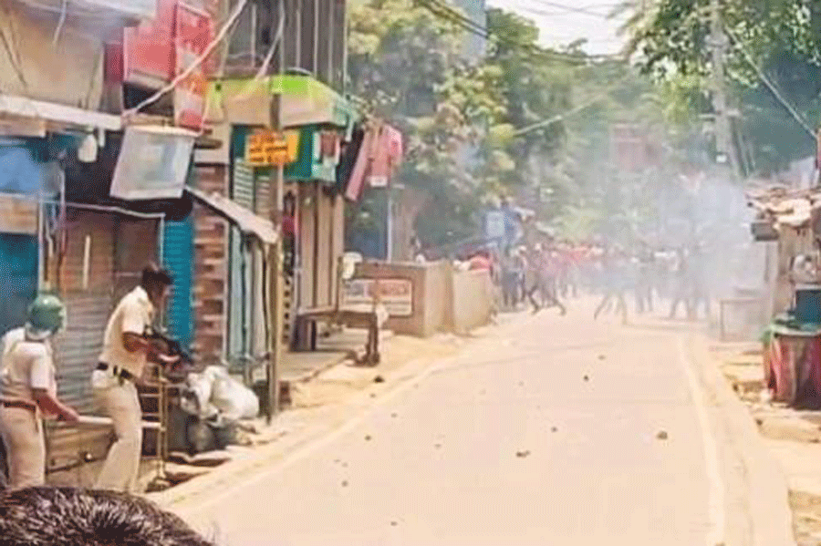 Police fire teargas at Bhangar on Wednesday.