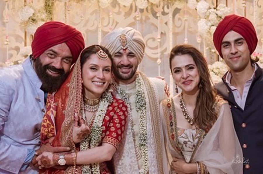 Bobby Deol, his wife Tania Deol and their kids posed for a group photo with the newlyweds.