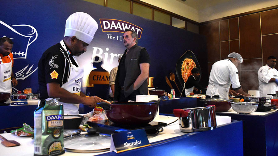 Chef Shaun Kenworthy, one of the judges at the event, inspecting the competition