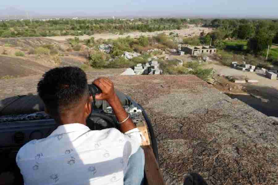 Bhawani Singh scanning the landscape for leopards