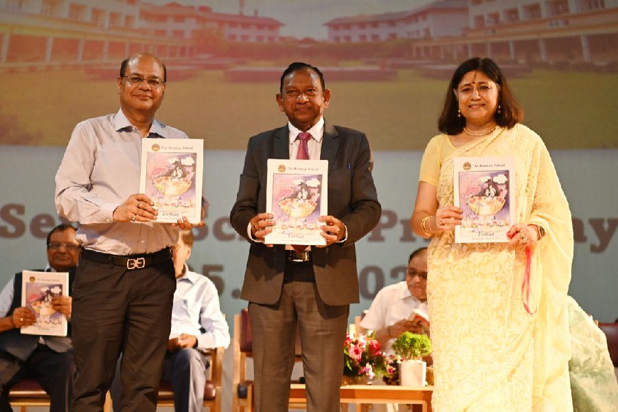(From left) Pradip Agarwal, CEO, Kalyan Bharti Trust, which runs The Heritage School; Gerry Arathoon, chief executive and secretary of the Council for the Indian School Certificate Examinations (CISCE); and Seema Sapru, principal, The Heritage School, release Vrittant, the annual school magazine, on Sunday