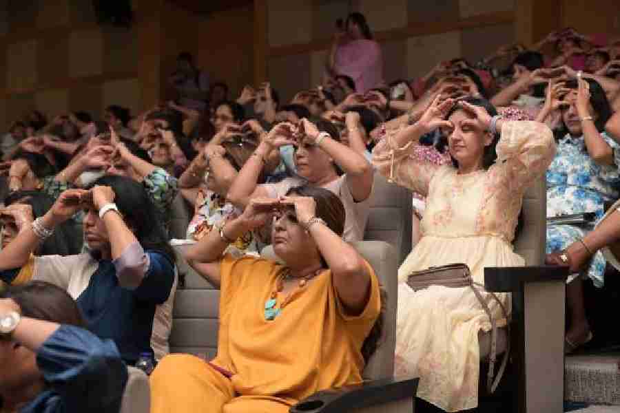Members of FICCI Flo at the face yoga session in IMI