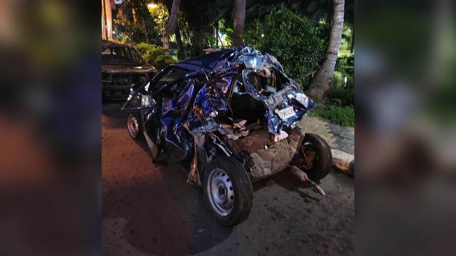 The mangled remains of the app cab that was involved in a crash near the Clock Tower on VIP Road in the small hours of Monday