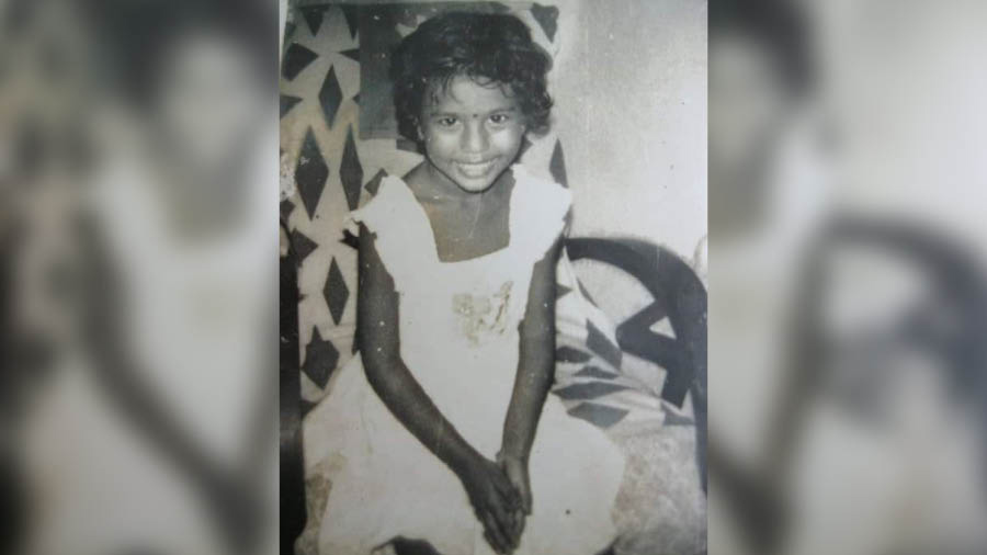 Rituparna as a kid at her village home