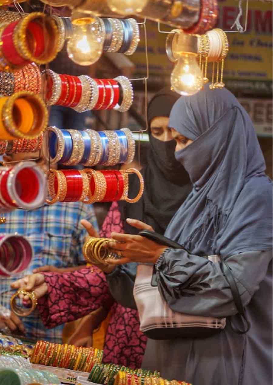 A day before Bakrid, women shop for colourful bangles at New Market on Wednesday 