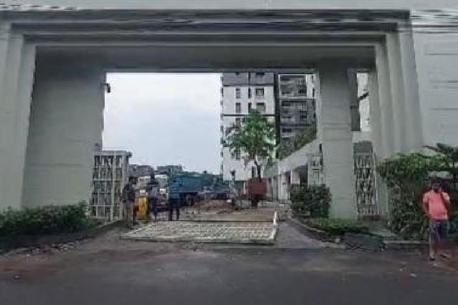 The gate of the under-construction housing complex in Behala that fell on Bimal Das
