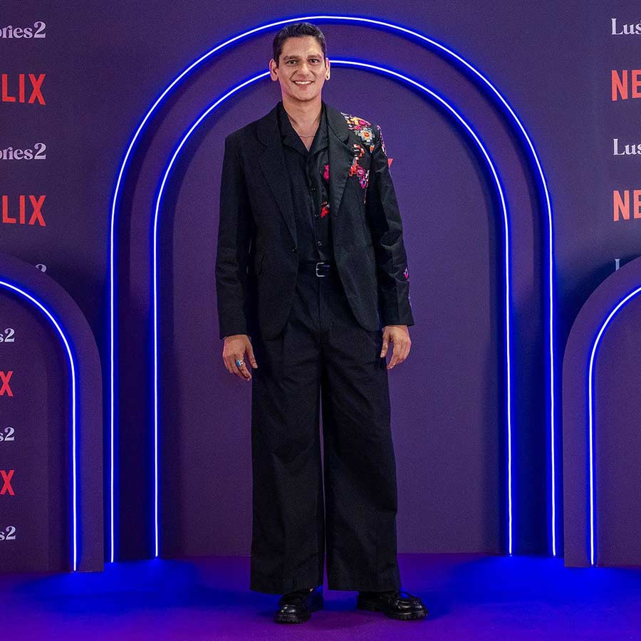 Vijay Varma looked dapper in a black shirt-and-trouser set and a black blazer with a floral design. 