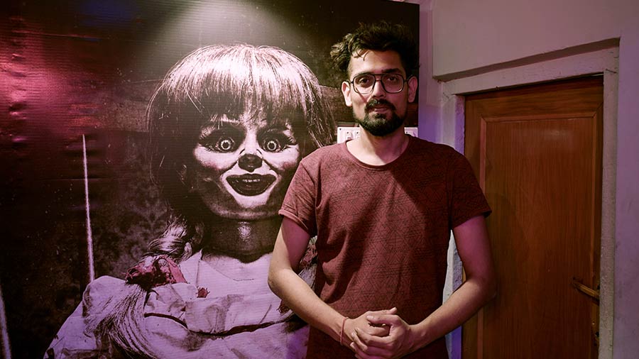 Click a selfie with Annabelle and live to tell the tale. In picture, the young owner of the cafe, Avishek Singh