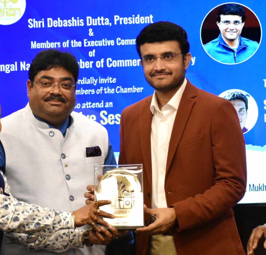 BNCCI president Debashis Dutta presents a memento to former Indian cricket captain Sourav Ganguly at an exclusive session organised at BNCCI House, Kolkata, on Wednesday