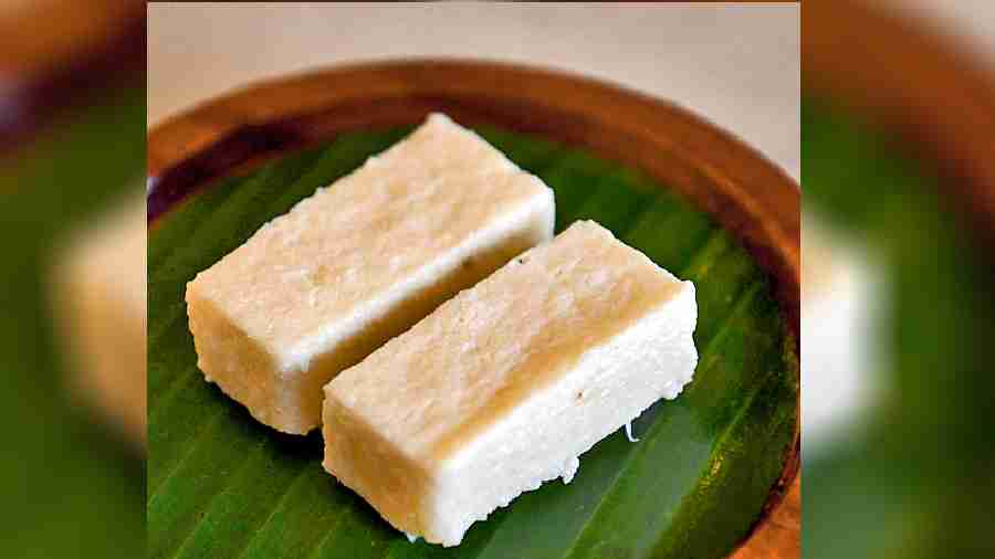 End the meal on a sweet note with this soothing Daab Sandesh where soft homemade sandesh is placed on tender coconut slabs.