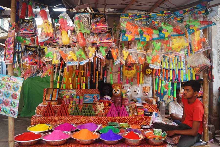 ‘Gulal’ and ‘pichkaris’ on sale at a shop in north Kolkata as the city gets ready to celebrate Holi on March 8