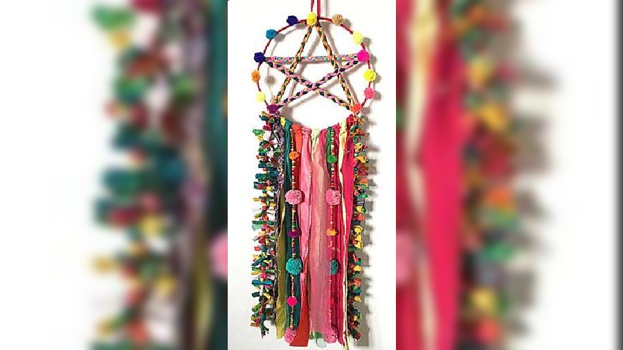 This unique and handmade wall hanging is colourful with a rustic charm. Elevate any corner of your home with it. Rs 595 @ amala.earth