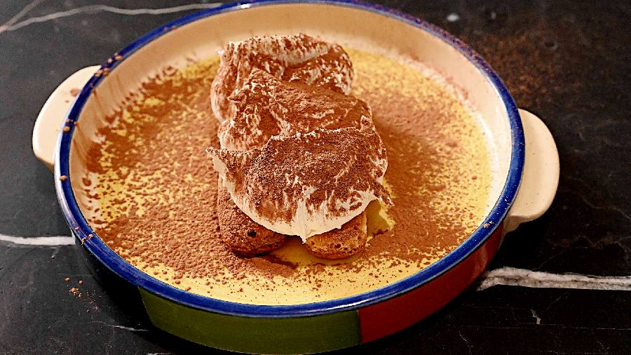 Deconstructed Tiramisu: This Italian classic is made live at your table. Two pieces of ladyfinger biscuits are topped with potent coffee liqueur, slathered with oodles of mascarpone and then drizzled with coffee powder.