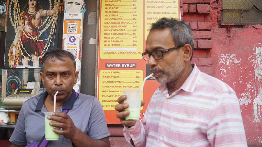 Sujoy Biswas (left) and his companion Tapan Pal are frequent customers of Shiv Assram