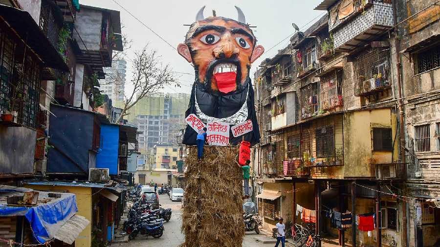 A 40-feet effigy highlighting the current issues has been installed ahead of 'Holika Dahan', at Worli in Mumbai.