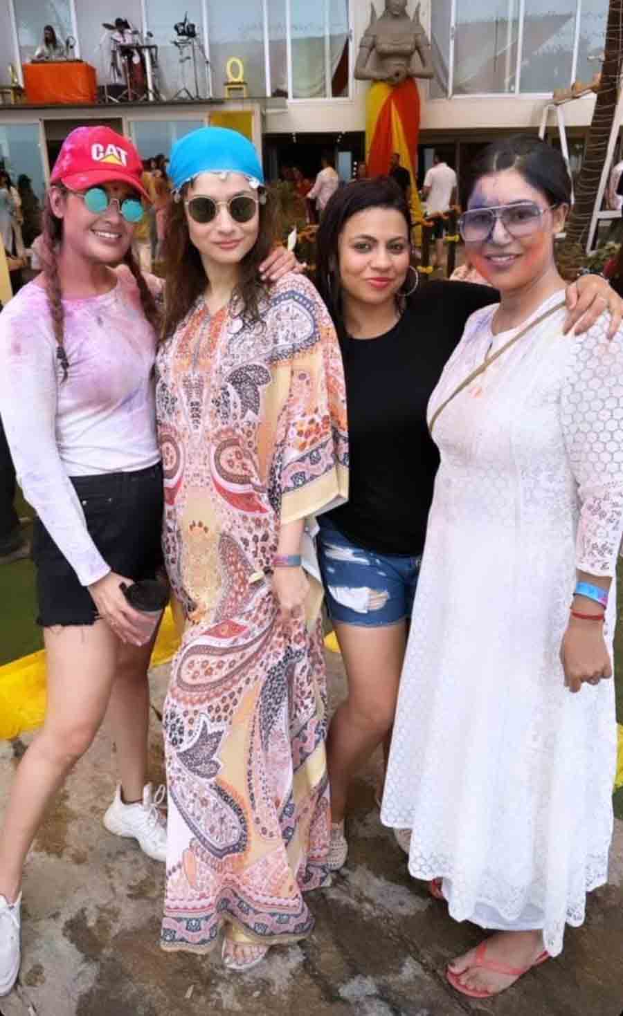 Ankita changed into a colourful kaftan and bandana before taking the stage to host the party. 