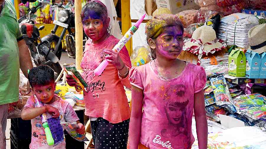 Holi celebrations in Burrabazar on Wednesday morning