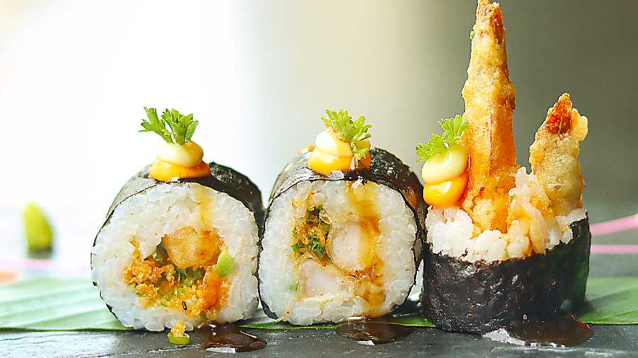 Prawn Tempura Roll: Crispy tempura batter-fried prawns meet the goodness of sushi rice in this bite-sized goodness. This can easily be an option if you’re new to sushi and wanting to try something out.