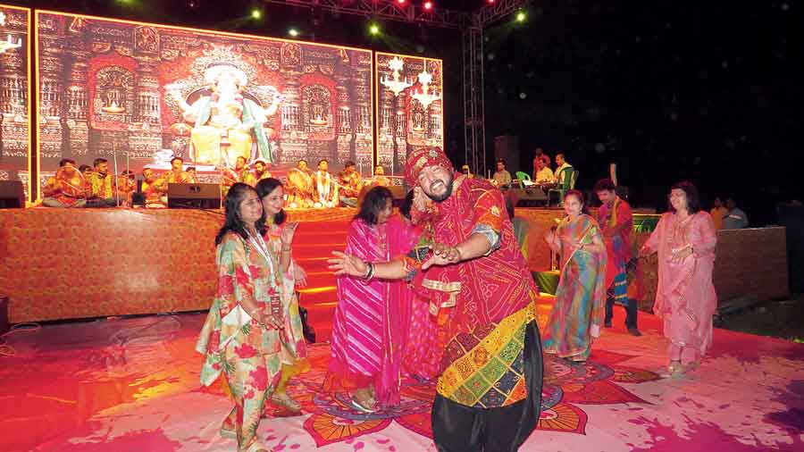 Women join members of Bawalia on the dance floor at Central Park. 