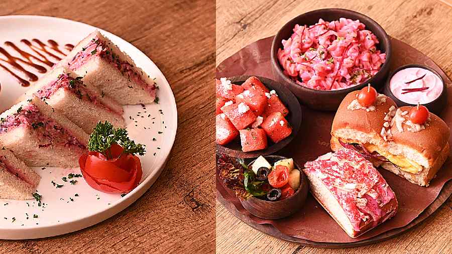 (l-r)Classic coleslaw sandwich is made with beetroot and layered between freshly baked bread, Pink pasta, fruit and caesar salads, and sliders make this platter satisfying