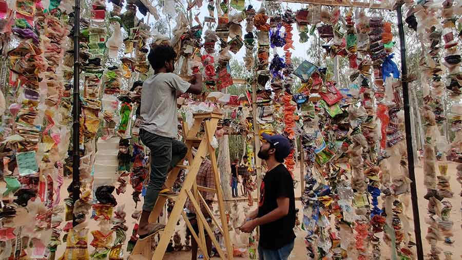 The colourful structure made of plastic waste left behind by visitors to Sonajhuri Haat 