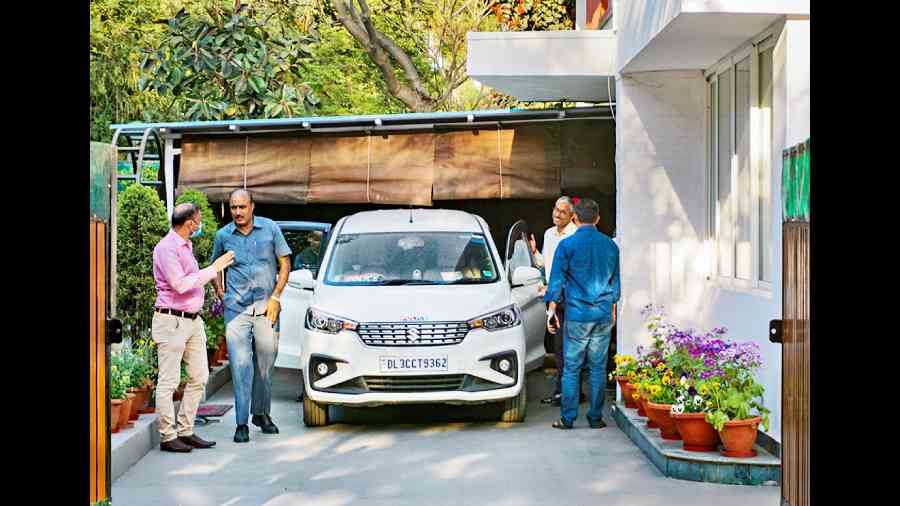 CBI officials leave the residence of Lalu’s daughter and RJD MP Misa Bharti in New Delhi on Tuesday.