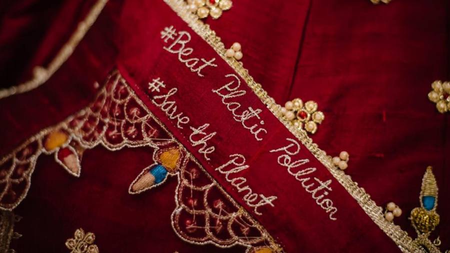 Nupur Agarwal's wedding dress was decorated with eco-friendly hashtags