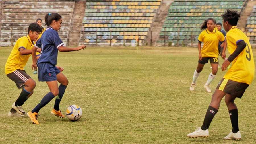 Players in action at a football match, part of Sampurna Cup, organised by the Indian Football Association and the International Human Rights Organisation  