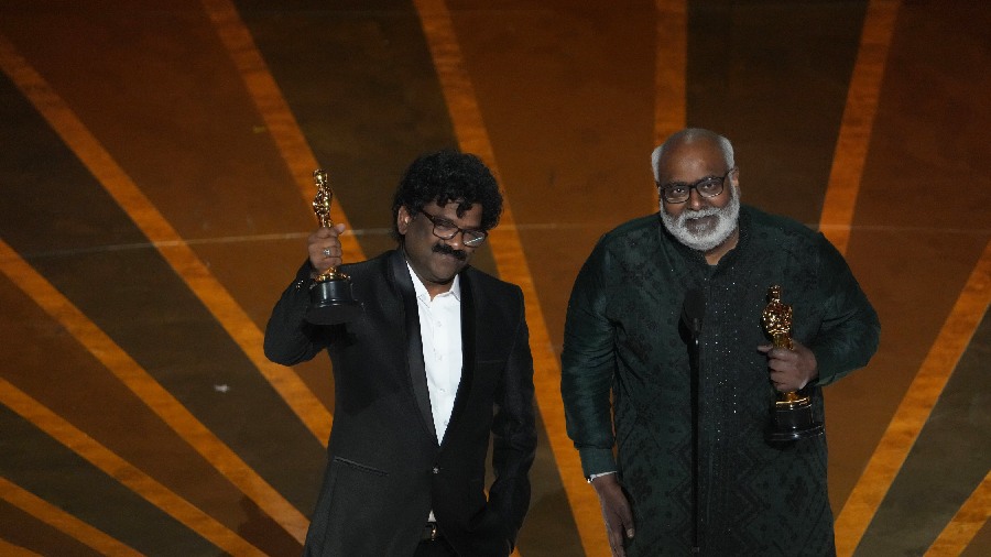 Chandrabose and M. M. Keeravani accept the award for best original song for 'Naatu Naatu' from 'RRR,' at the 95th Academy Awards. This is the third major international recognition for the chartbuster 'Naatu Naatu', composed by MM Keeravaani and penned by Chandrabose, after a Golden Globe and Critics Choice Award. 'RRR' (Hindi) is available for viewing on Netflix. 