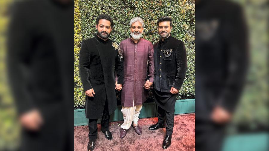 Filmmaker SS Rajamouli's period action blockbuster 'RRR' charted history by becoming the first Indian track to win the Academy Award in the Best Original Song category for 'Naatu Naatu'.  Film director S.S. Rajamouli and actors Jr. NTR and Ram Charan at the Oscars 2023. 