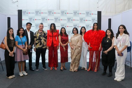 Final year students along with the academic team of Pearl Academy at the finale of Lakme Fashion Week X FDCI