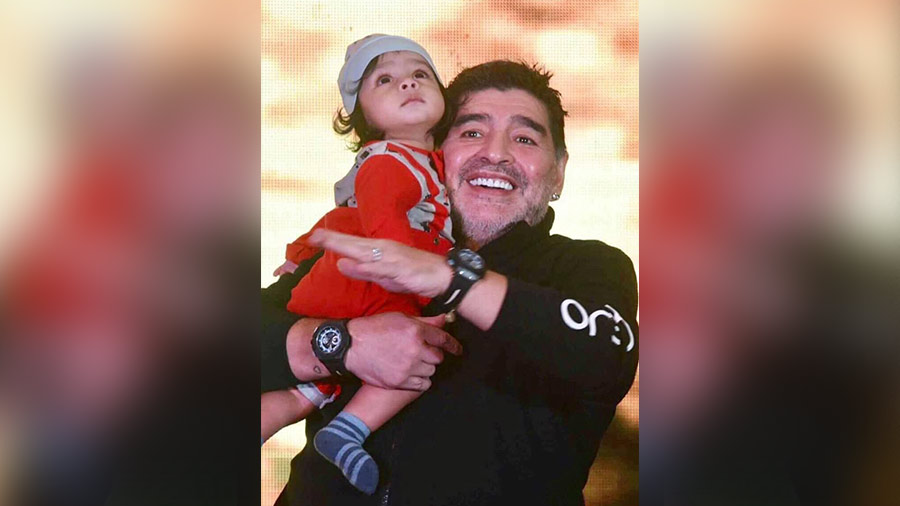 Maradona with Dutta’s son, who is called Diego in the Argentine’s honour