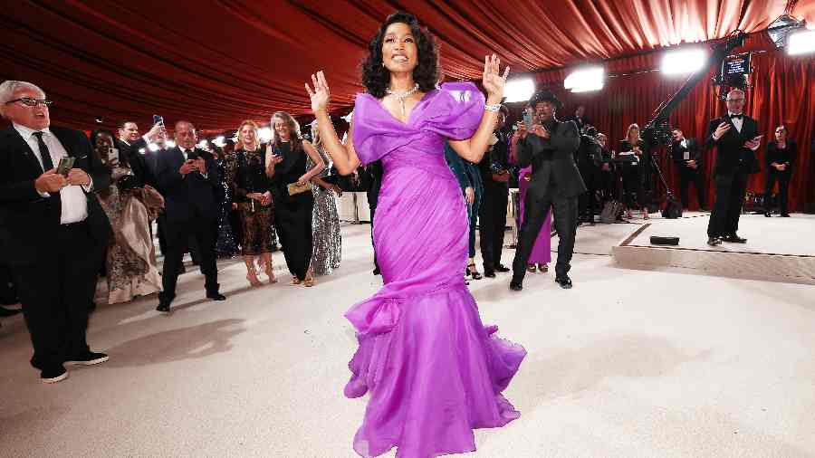 A frilly, shapely purple gown was Black Panther: Wakanda Forever actress Angela Bassett’s chosen OOTN. While she stuck to diamonds for a safe bet for jewellery options, she went the bold way with lilac lips that she effortlessly pulled off. 