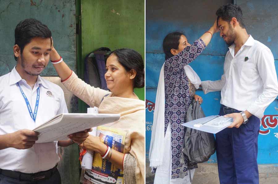 Mothers of two students bless their children before they enter the examination hall for the first HS paper. Candidates have been advised to reach the venue one hour before the exam starts on the first day and 30 minutes in advance on the other days.  