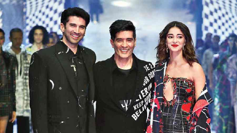 (L-R) Aditya Roy Kapur, Manish Maholtra and Ananya Panday take a bow at the Lakme Grand Finale in Mumbai on  Sunday