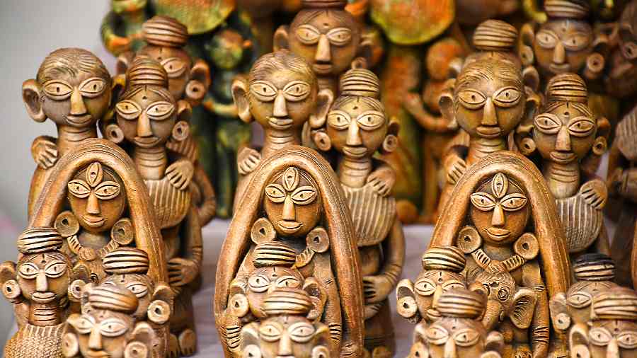 Hand-crafted on wood, these beautiful figurines of goddess Durga with her brood, village couples and more, are fast flying off the display shelves.