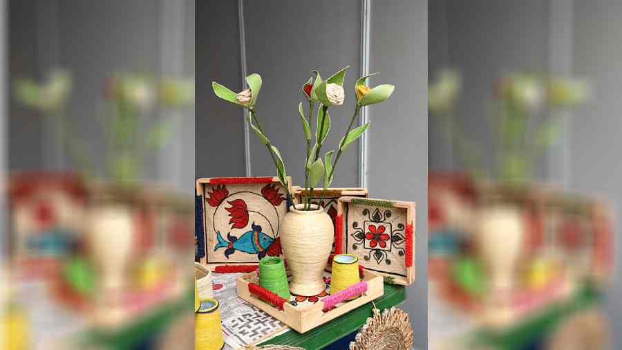Artistically-designed home decor products like wall-hangings, coasters, photo-frames, flower vases and pencil stands, made with eco-friendly materials like coconut coir, jute and bamboo are also on display.