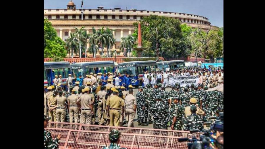 Security personnel deployed during the march of Opposition MPs in New Delhi on Wednesday