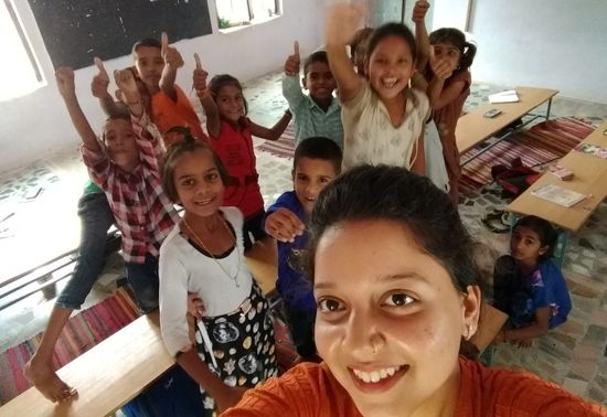 Tanisha with the children at rural Rajasthan where she taught and mentored 